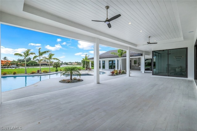 view of patio featuring ceiling fan