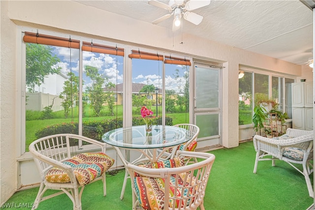 sunroom / solarium with ceiling fan