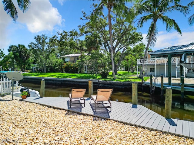 view of dock with a water view