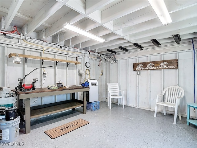 basement with a workshop area