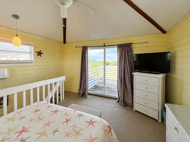 carpeted bedroom with access to exterior, ceiling fan, and vaulted ceiling