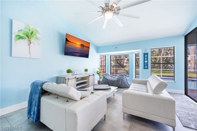 living room with ceiling fan and vaulted ceiling