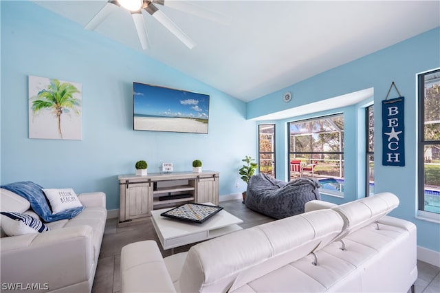 living room featuring lofted ceiling and ceiling fan