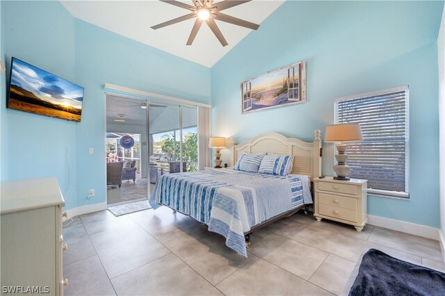 bedroom with ceiling fan, high vaulted ceiling, light tile patterned flooring, and access to exterior