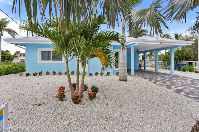 exterior space featuring a carport