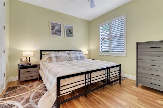 bedroom with light hardwood / wood-style floors