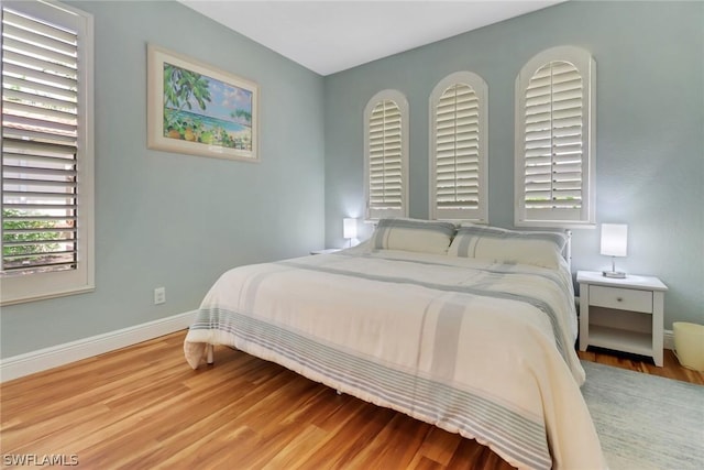 bedroom featuring hardwood / wood-style floors