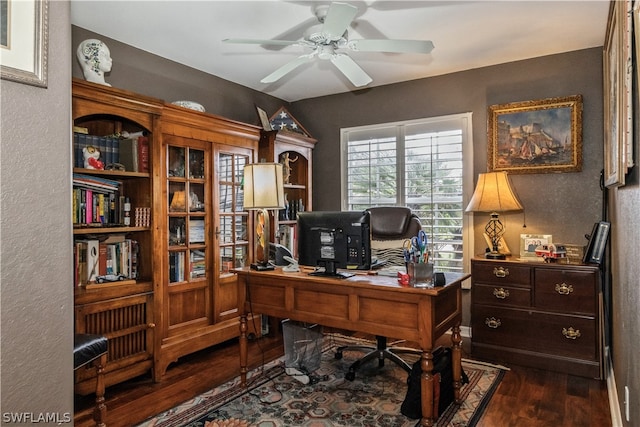 office space with dark hardwood / wood-style floors and ceiling fan