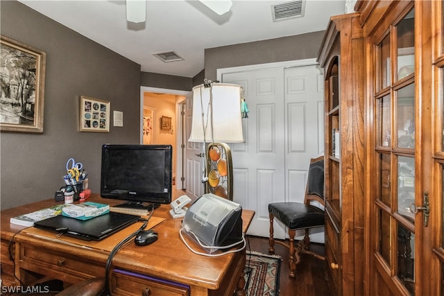 home office with wood-type flooring and ceiling fan