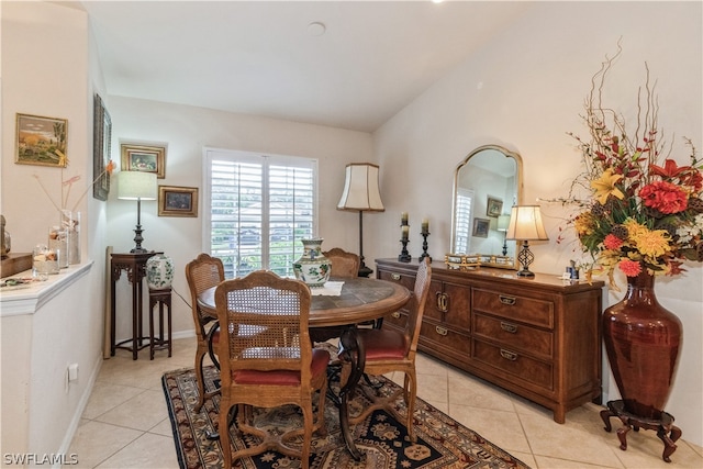 dining room with light tile patterned flooring