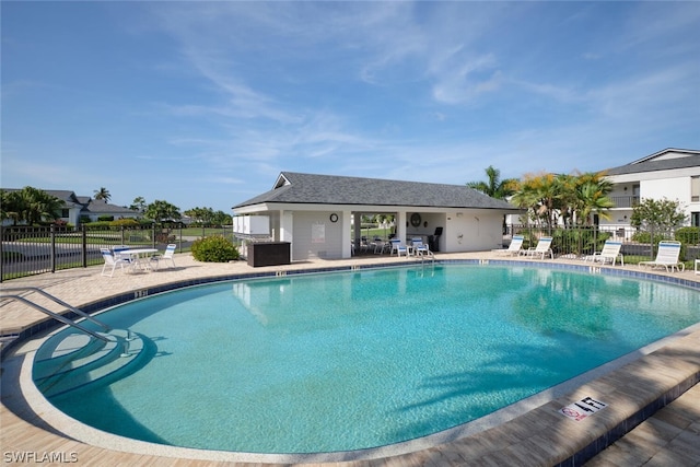 view of swimming pool featuring a patio