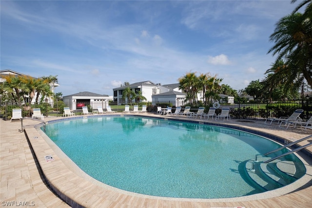 view of swimming pool featuring a patio