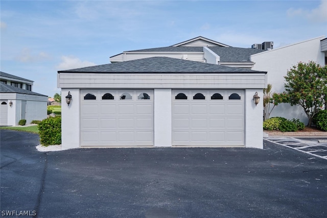 16580 Waters Edge Ct Unit 102, Fort Myers, FL 33908 - garage featuring driveway