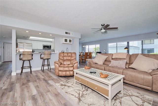 16580 Waters Edge Ct Unit 102, Fort Myers, FL 33908 - living area featuring a ceiling fan, light wood-type flooring, baseboards, visible vents, and recessed lighting