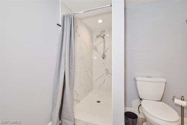 16580 Waters Edge Ct Unit 102, Fort Myers, FL 33908 - full bathroom featuring baseboards, toilet, and a marble finish shower