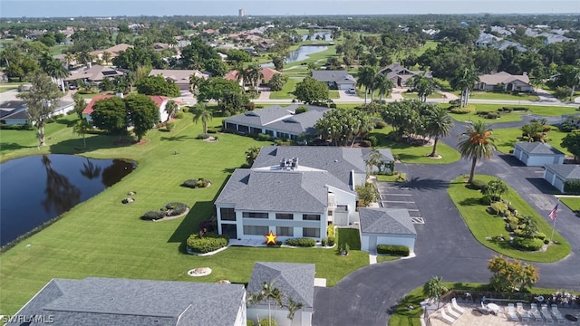 16580 Waters Edge Ct Unit 102, Fort Myers, FL 33908 - drone / aerial view with a water view and a residential view