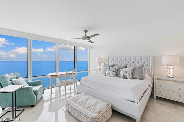 bedroom featuring expansive windows, a water view, light tile patterned floors, and ceiling fan