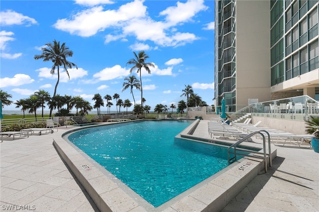 view of pool featuring a patio area