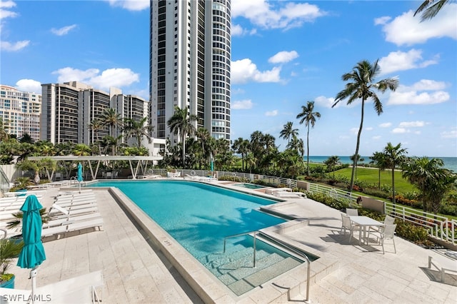 view of swimming pool with a patio area