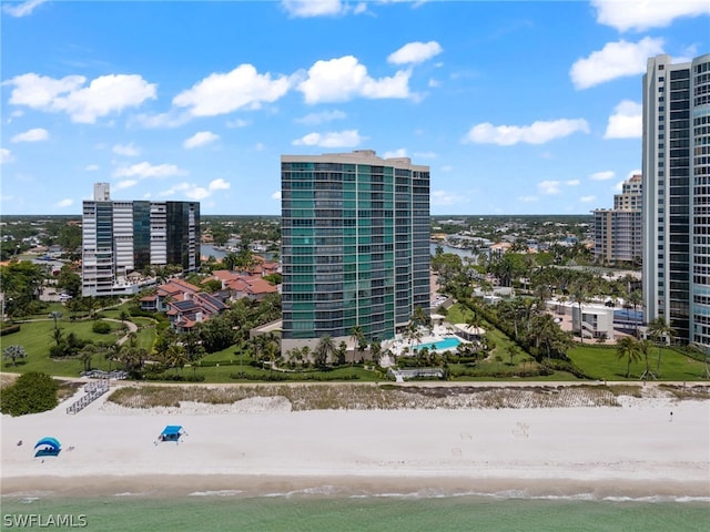 drone / aerial view with a view of the beach and a water view