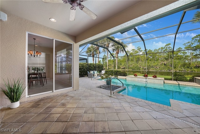 view of pool featuring a patio, a lanai, and ceiling fan