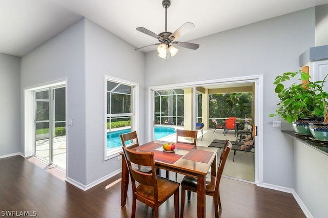 dining area with a wealth of natural light, ceiling fan, and hardwood / wood-style floors