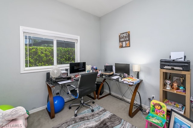 home office featuring light colored carpet