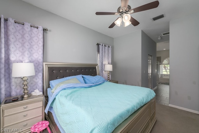 carpeted bedroom with ceiling fan