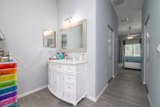 bathroom featuring vanity and ceiling fan