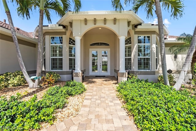 property entrance featuring french doors