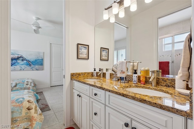 bathroom with vanity, ceiling fan, and tile patterned floors