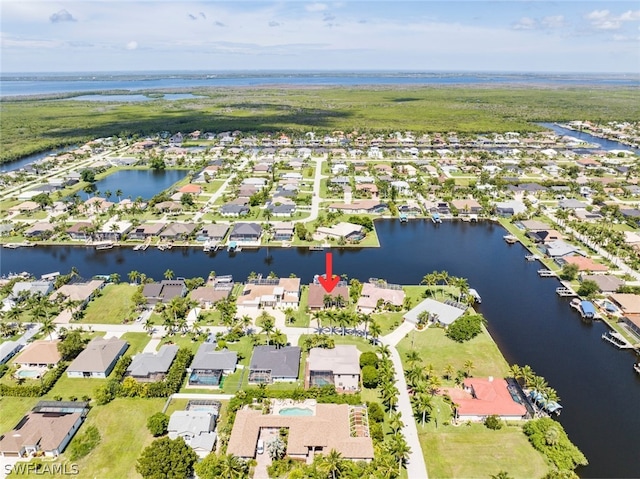 drone / aerial view featuring a water view