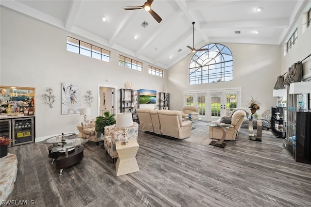 living room featuring french doors, beam ceiling, high vaulted ceiling, ceiling fan, and wood-type flooring