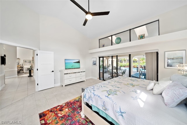 tiled bedroom with ceiling fan, access to exterior, and high vaulted ceiling