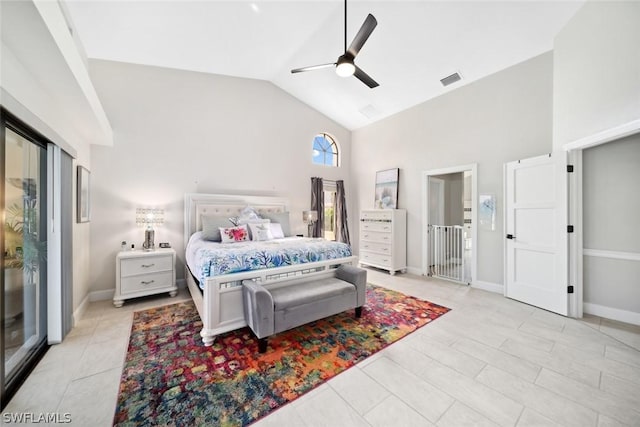 bedroom featuring ceiling fan and high vaulted ceiling