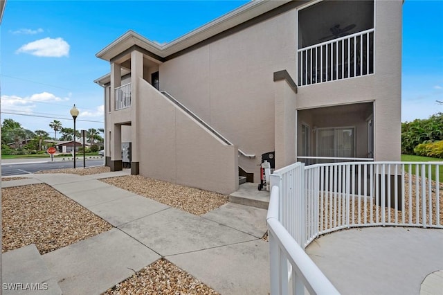 exterior space with stucco siding