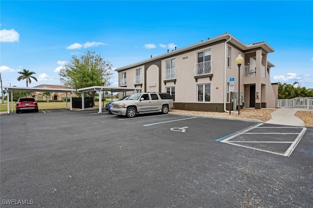 view of partially covered parking lot