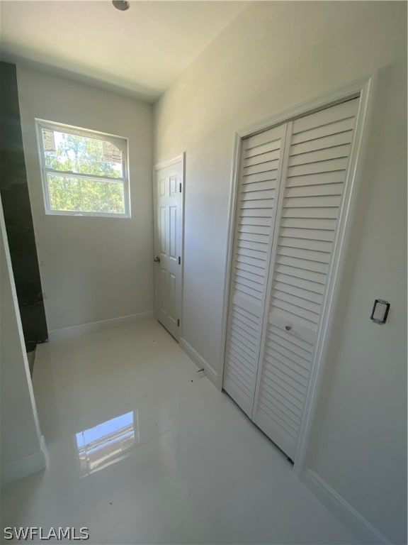 unfurnished bedroom with a closet