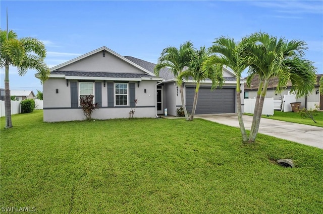 ranch-style house featuring a garage and a front lawn