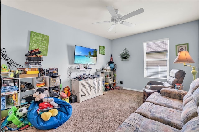 carpeted living room featuring ceiling fan