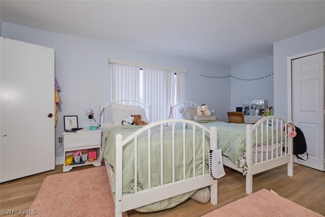 bedroom featuring light hardwood / wood-style floors