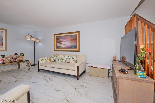 living room with light tile patterned floors