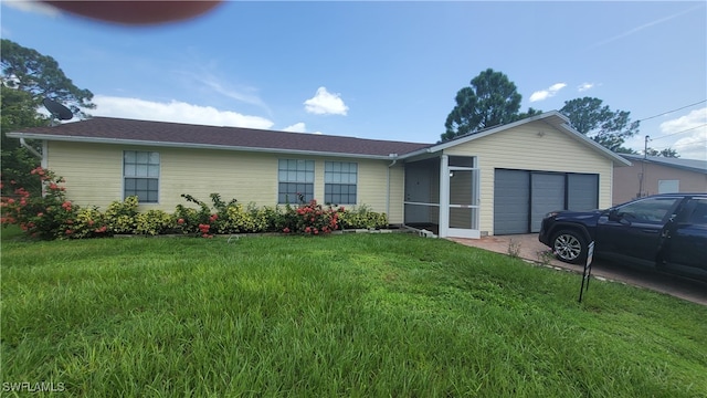 single story home with a front yard