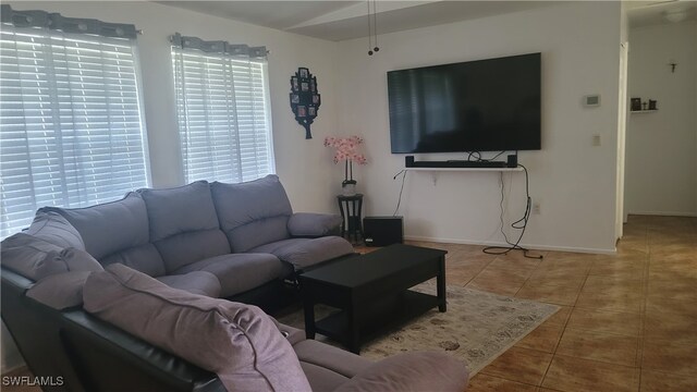 living room featuring tile patterned flooring