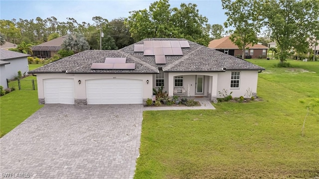 single story home with a garage, a front lawn, and stucco siding