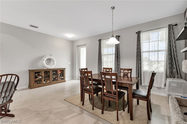 view of tiled dining room