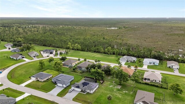 birds eye view of property with a residential view