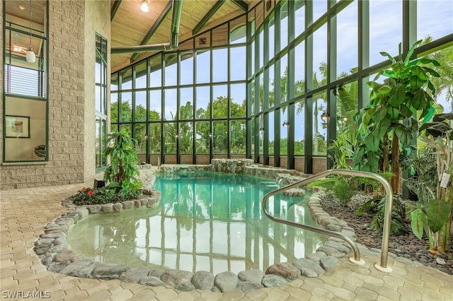 view of pool featuring pool water feature