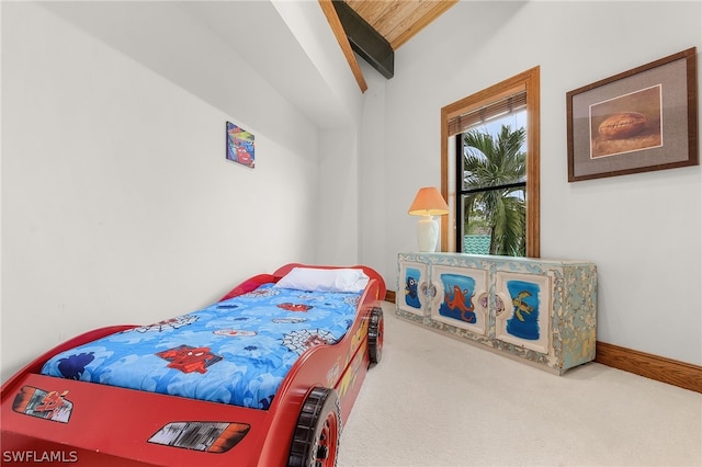 carpeted bedroom featuring wood ceiling and vaulted ceiling