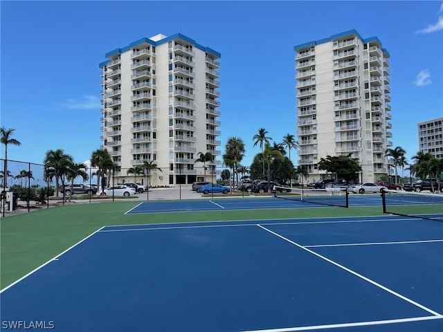 view of sport court with basketball hoop